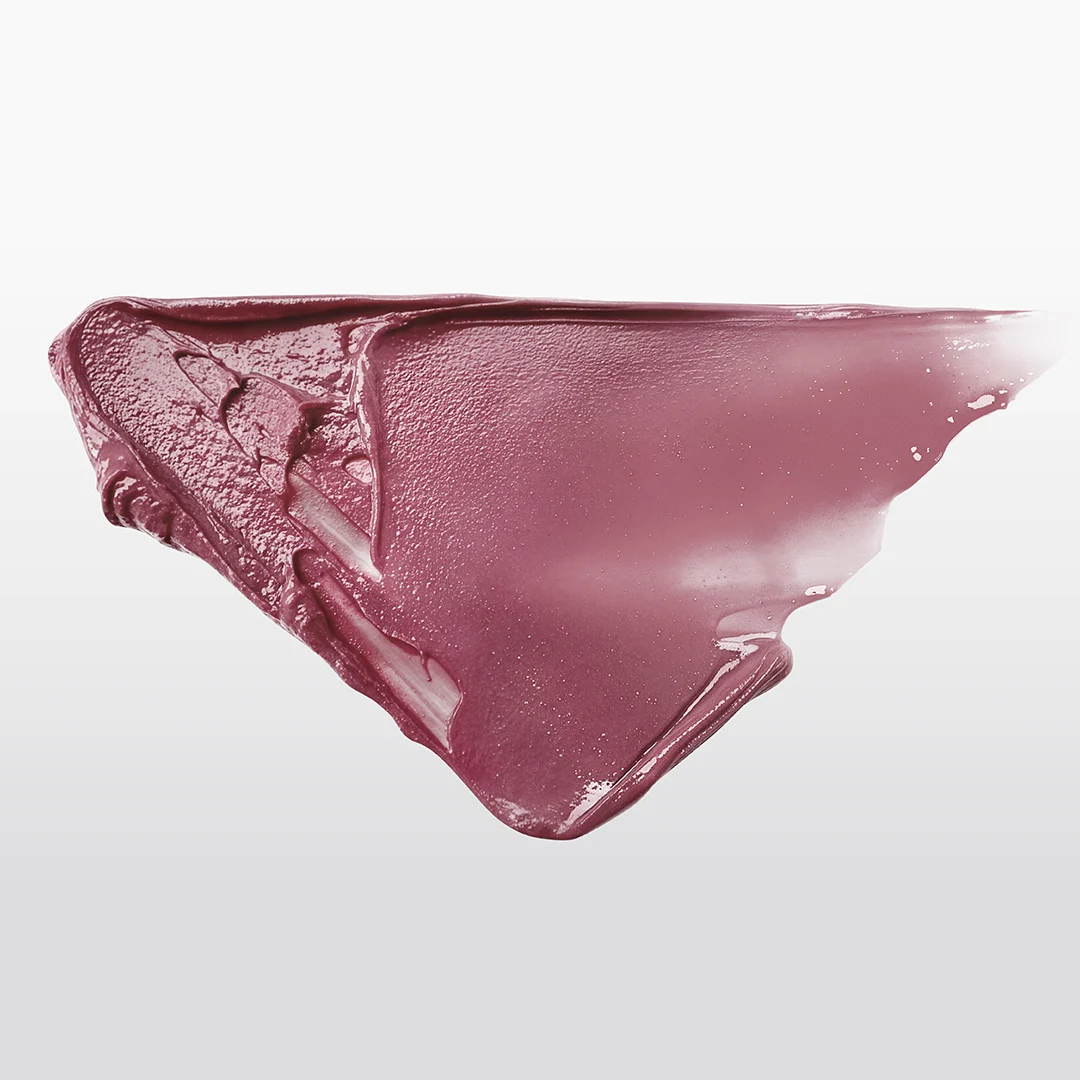 A lipstick swatch, cut as the Prada triangle